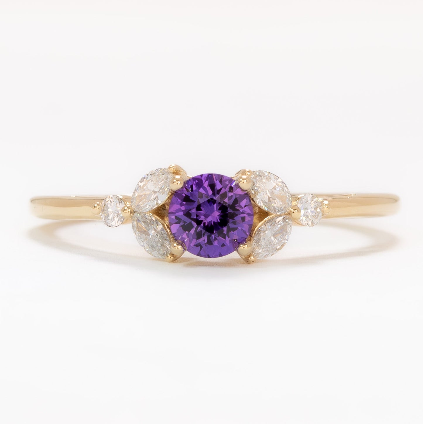 nature inspired lili engagement ring with round purple lab sapphire