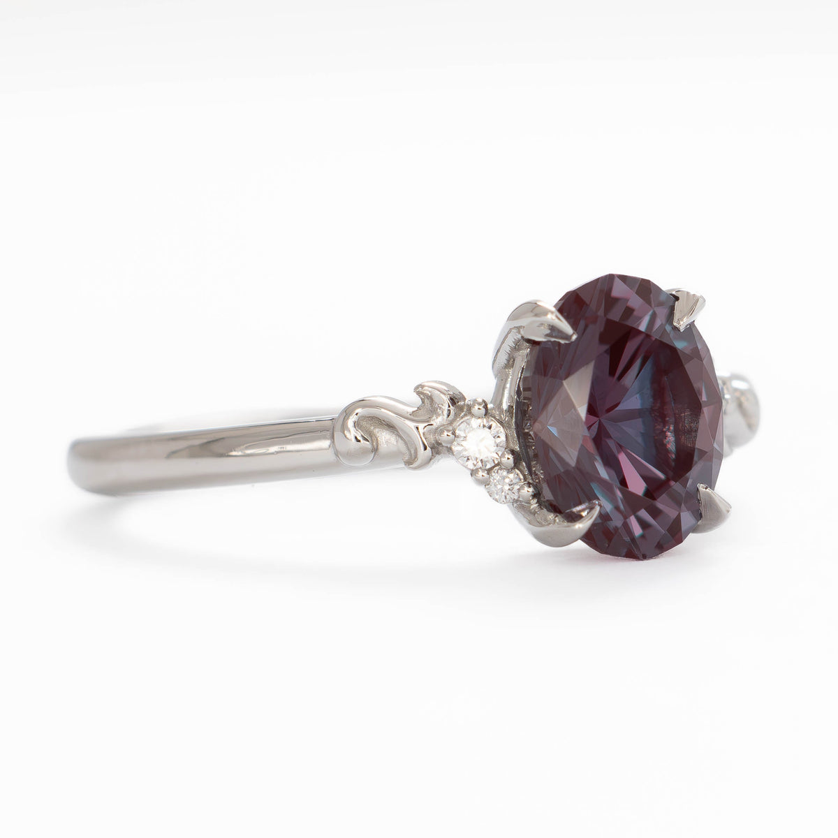 nellie nature inspired ring in white gold with oval lab alexandrite