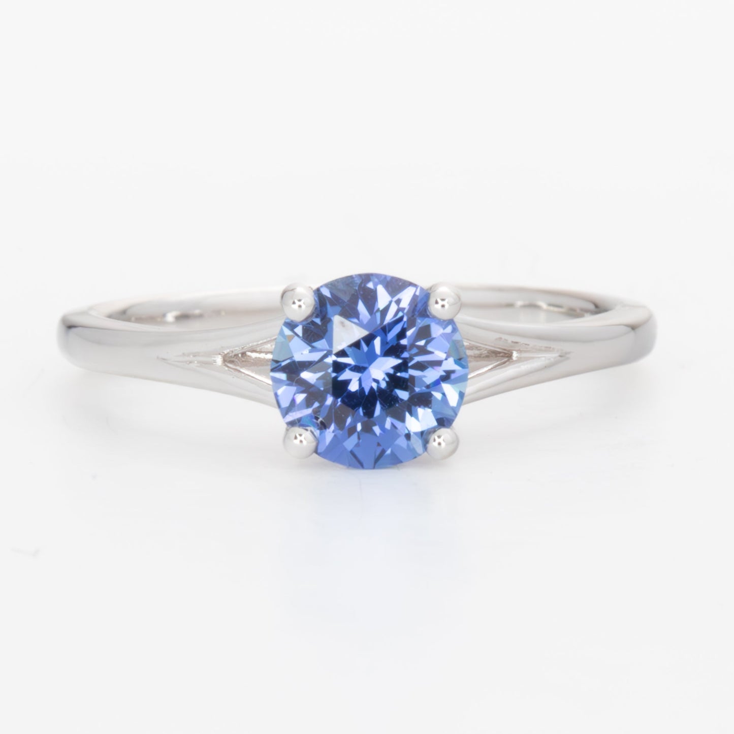 neve engagement ring with periwinkle blue round lab sapphire