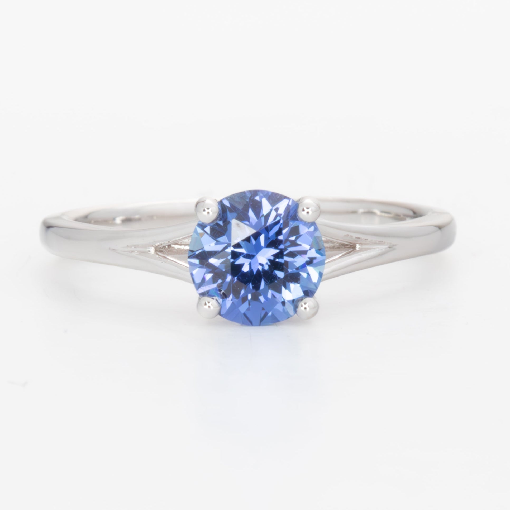neve engagement ring with periwinkle blue round lab sapphire