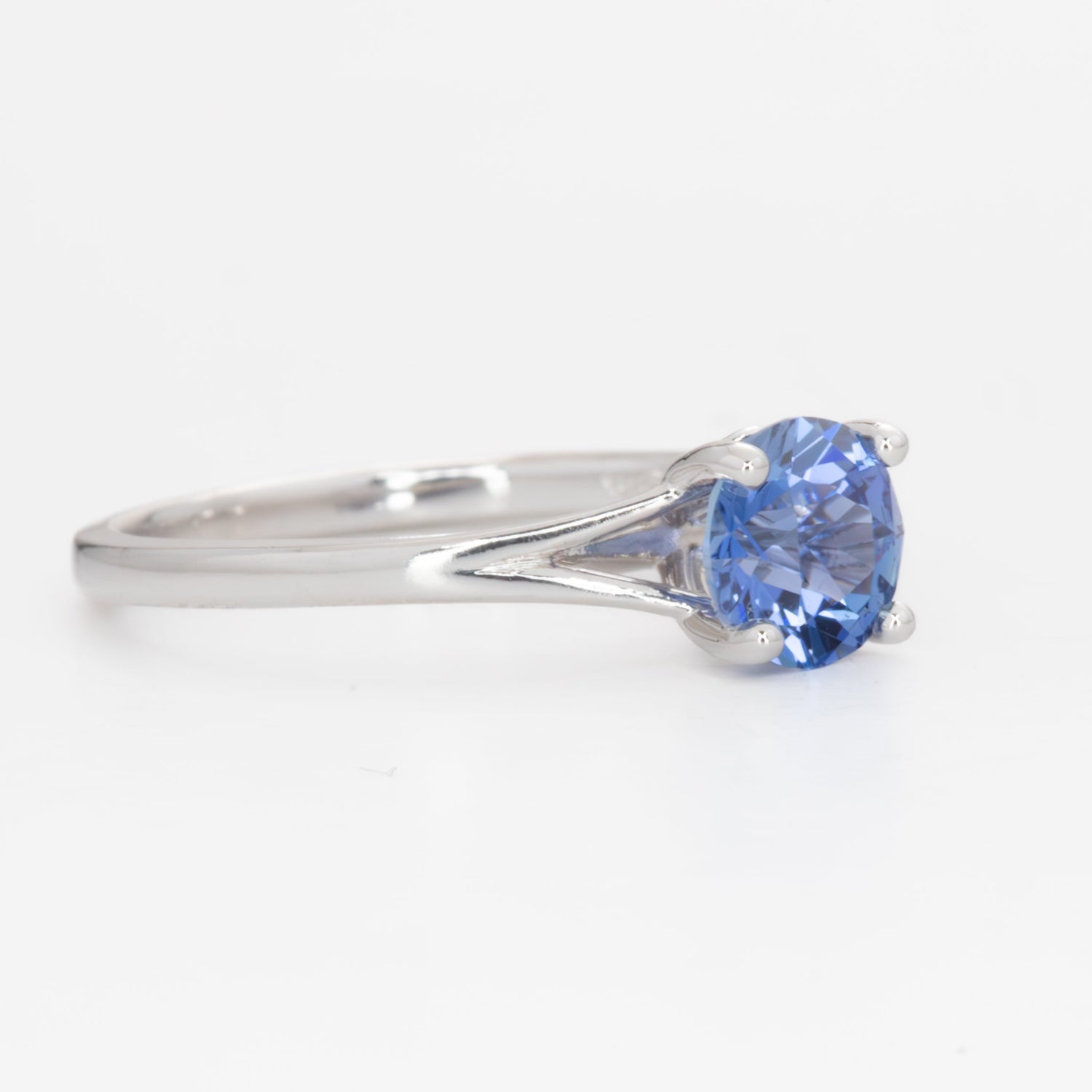 neve engagement ring with periwinkle blue round lab sapphire