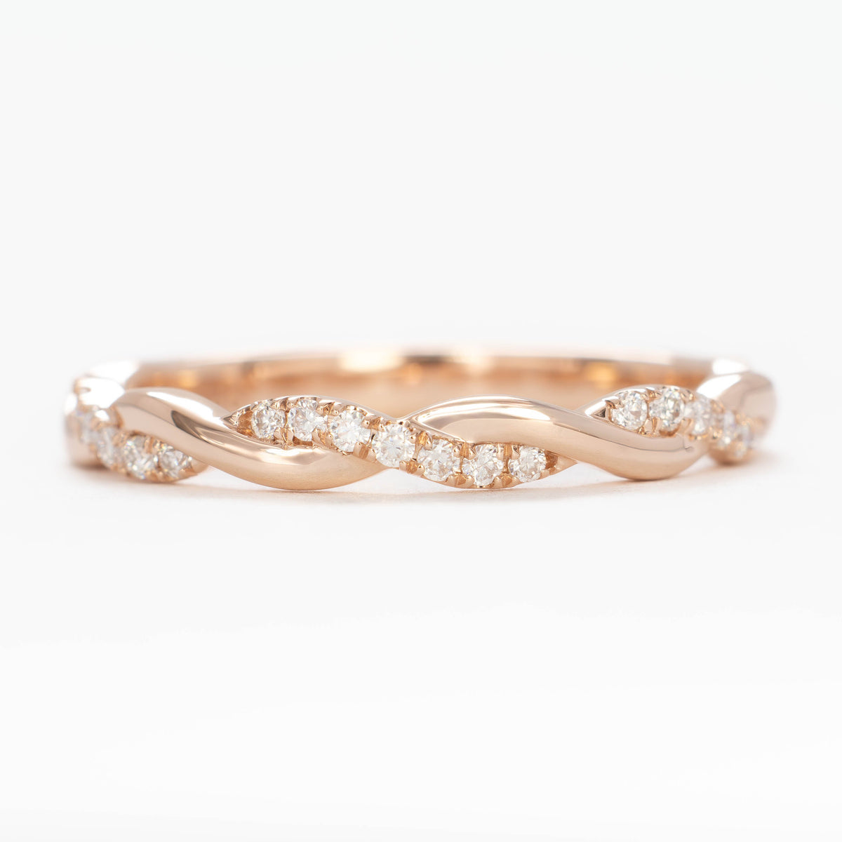 odette accented twist wedding band in rose gold and lab diamonds