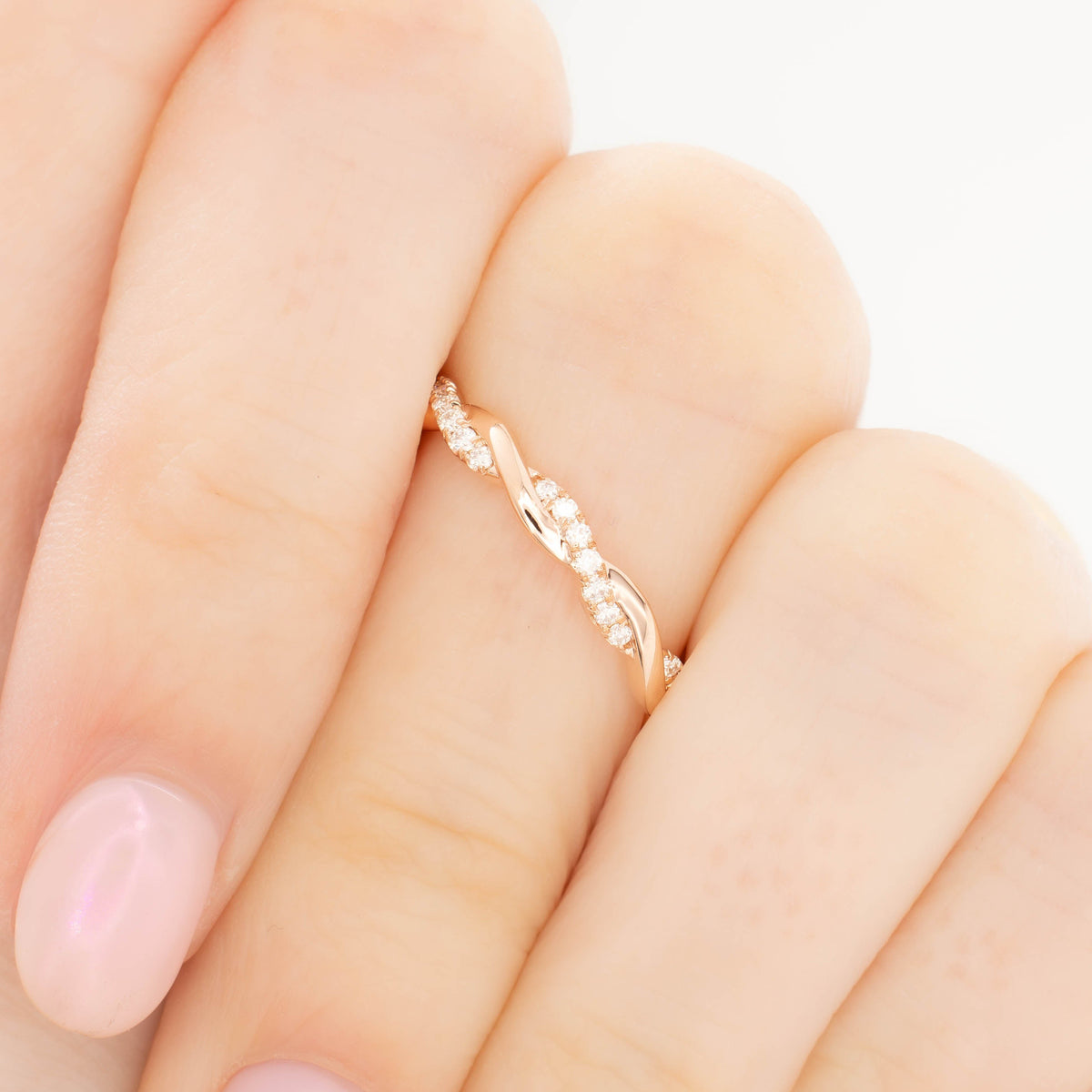 odette accented twist wedding band in rose gold and lab diamonds
