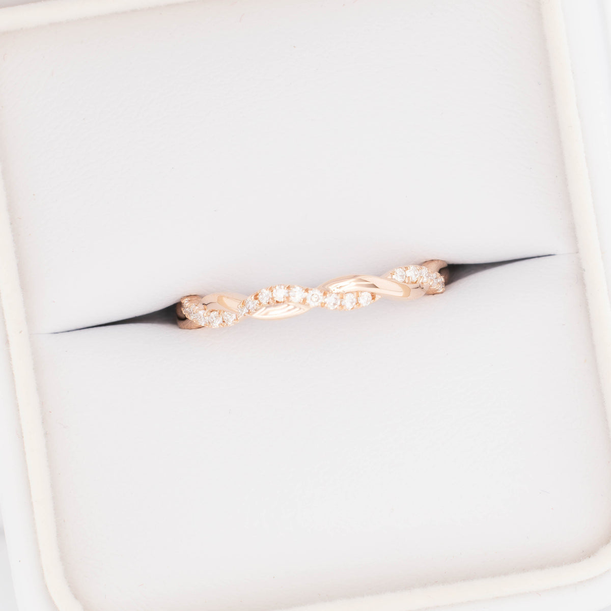 odette accented twist wedding band in rose gold and lab diamonds