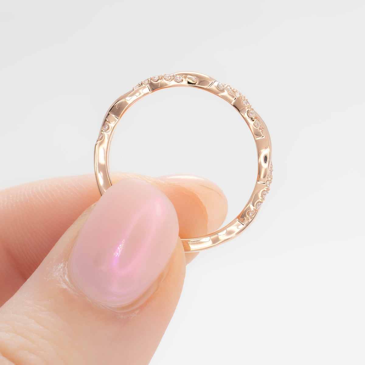 odette accented twist wedding band in rose gold and lab diamonds