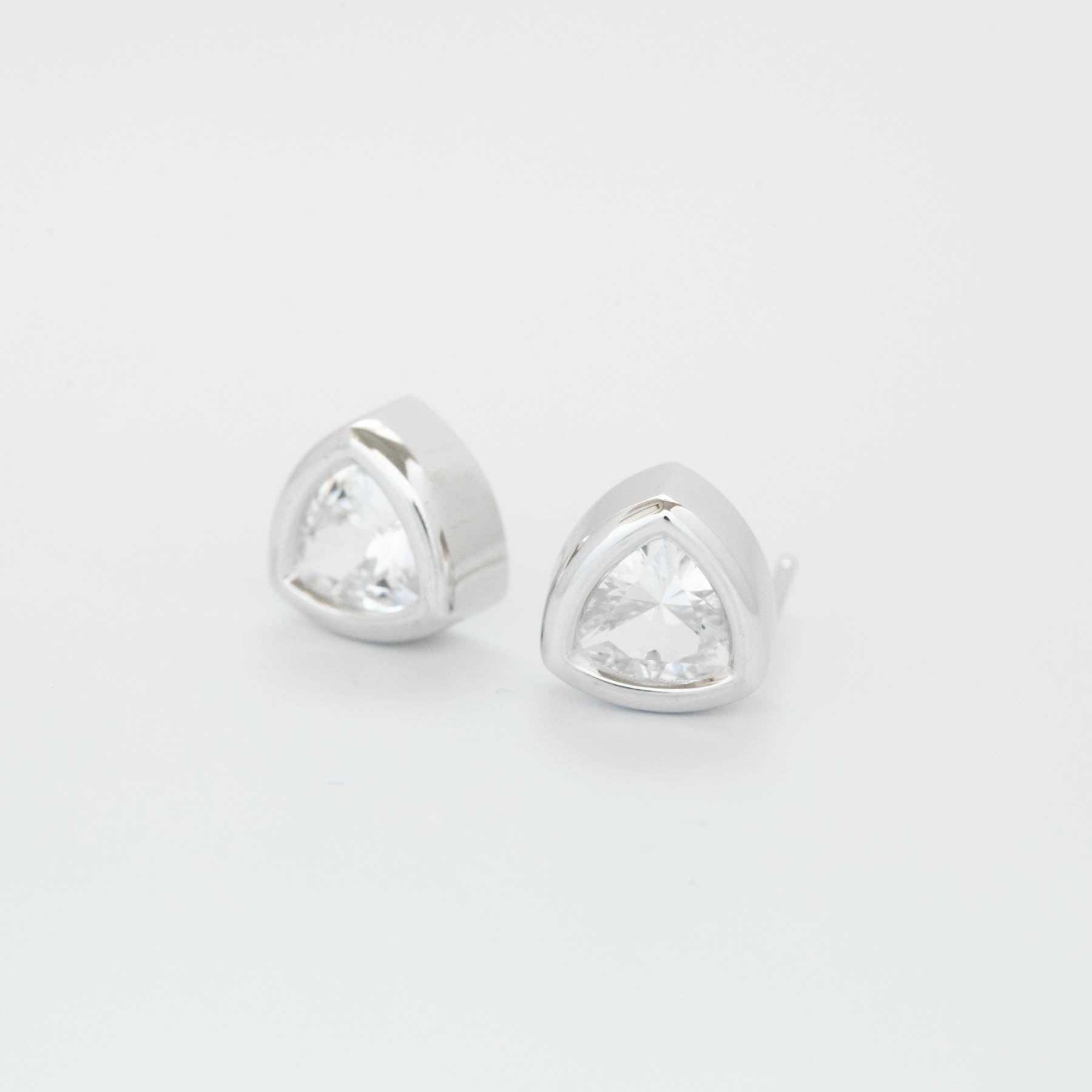 bezel set white sapphire earrings 