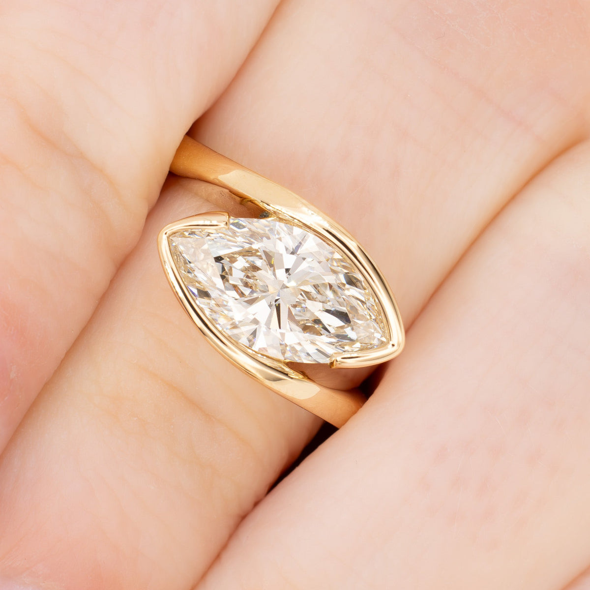 olivia bypass solitaire ring in yellow gold with marquise lab diamond