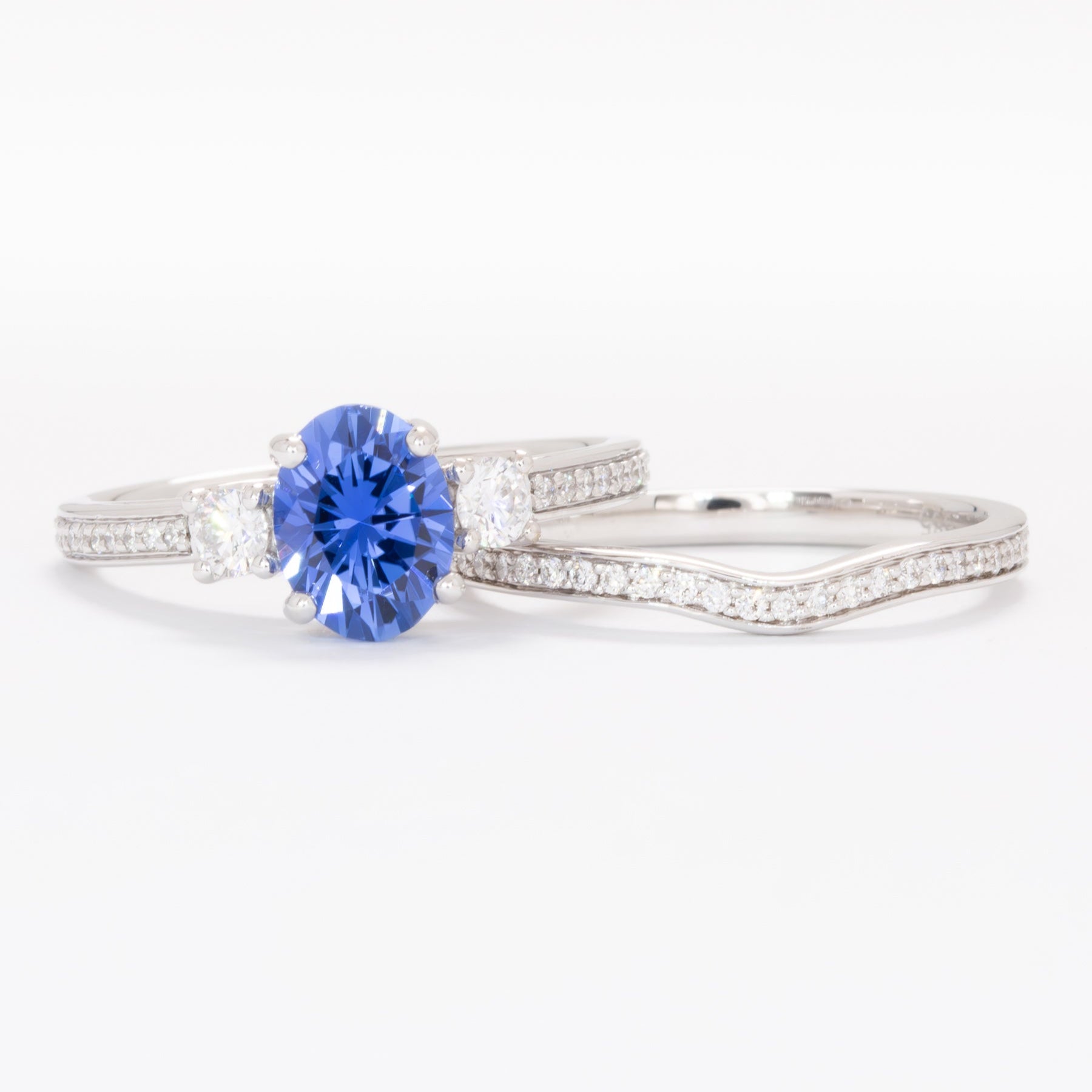 oriane wedding set in white gold with blue oval lab sapphire