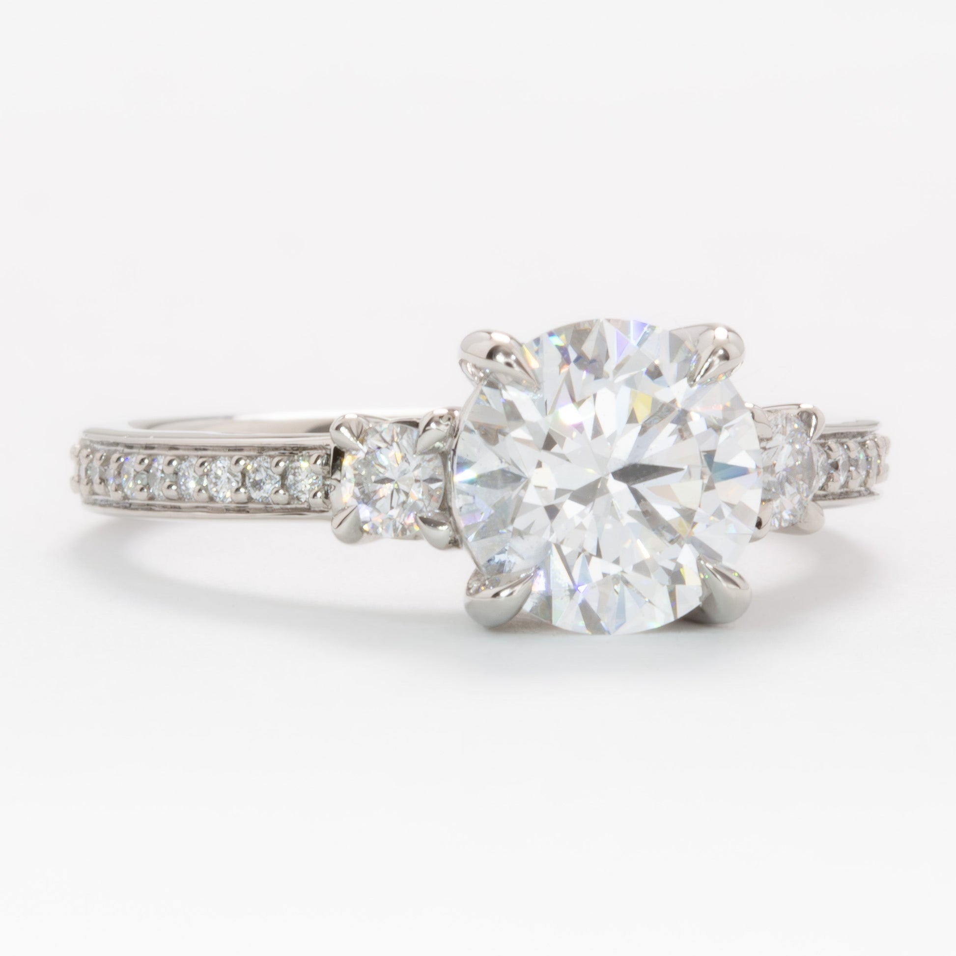 oriane three stone ring in platinum with round lab diamond
