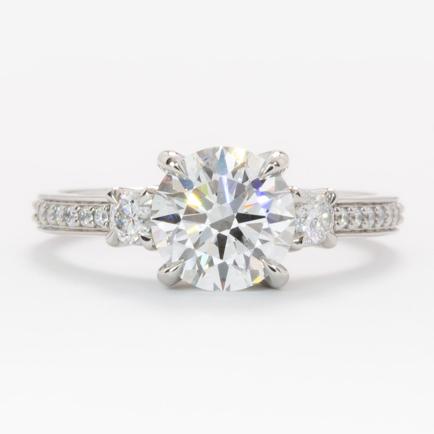 oriane three stone ring in platinum with round lab diamond