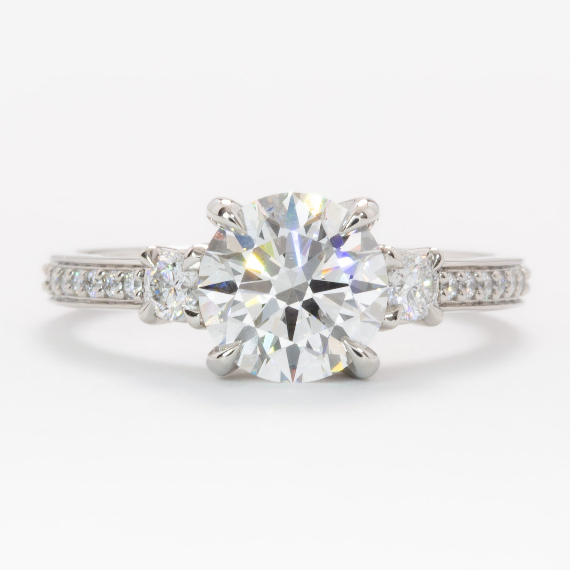 oriane three stone ring in platinum with round lab diamond