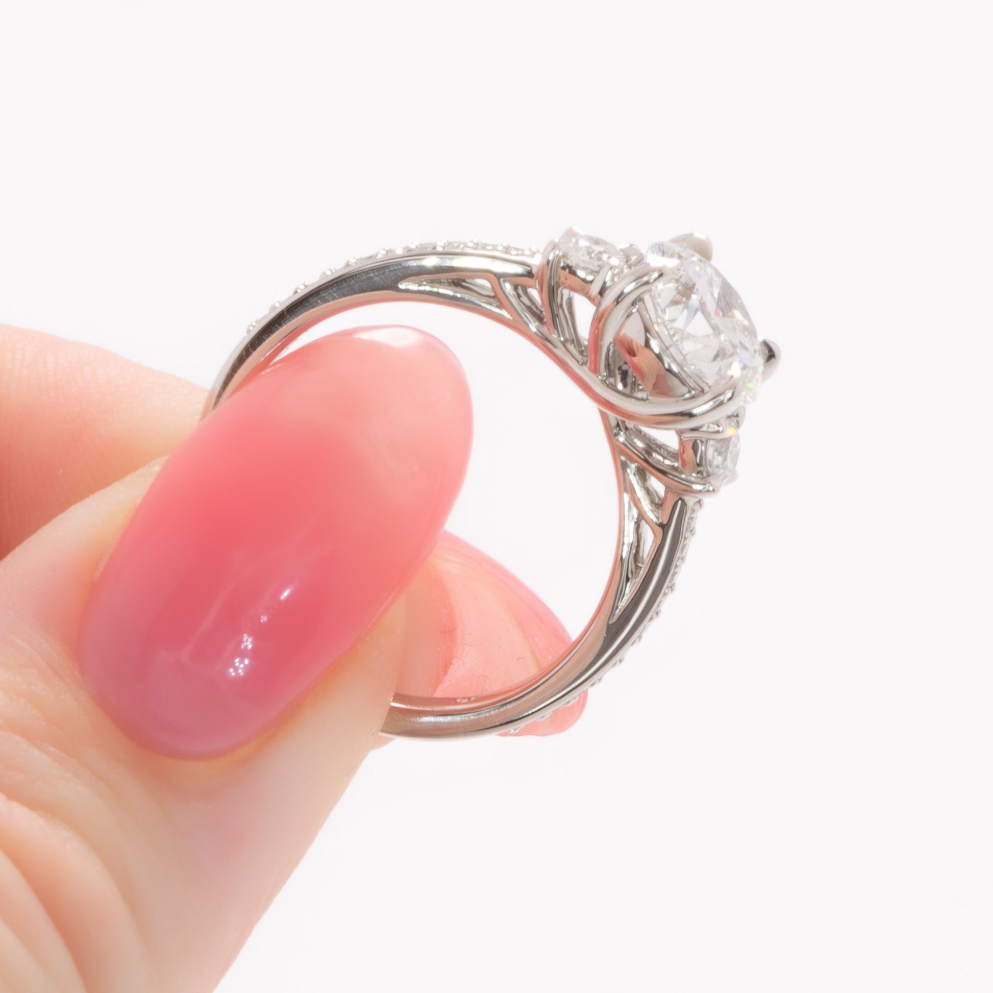 oriane three stone ring in platinum with round lab diamond
