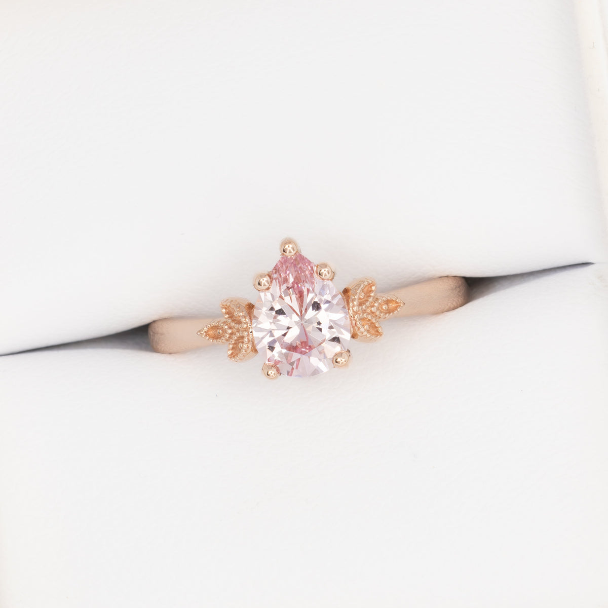 paloma milgrain solitaire ring in rose gold with peach lab sapphire pear