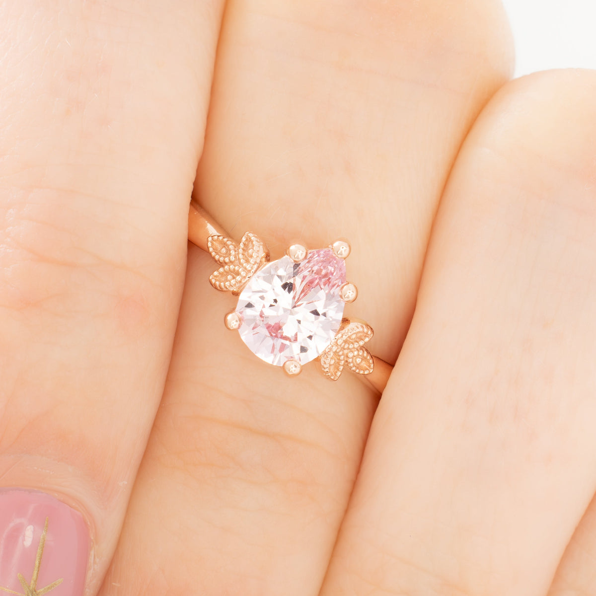 paloma milgrain solitaire ring in rose gold with peach lab sapphire pear