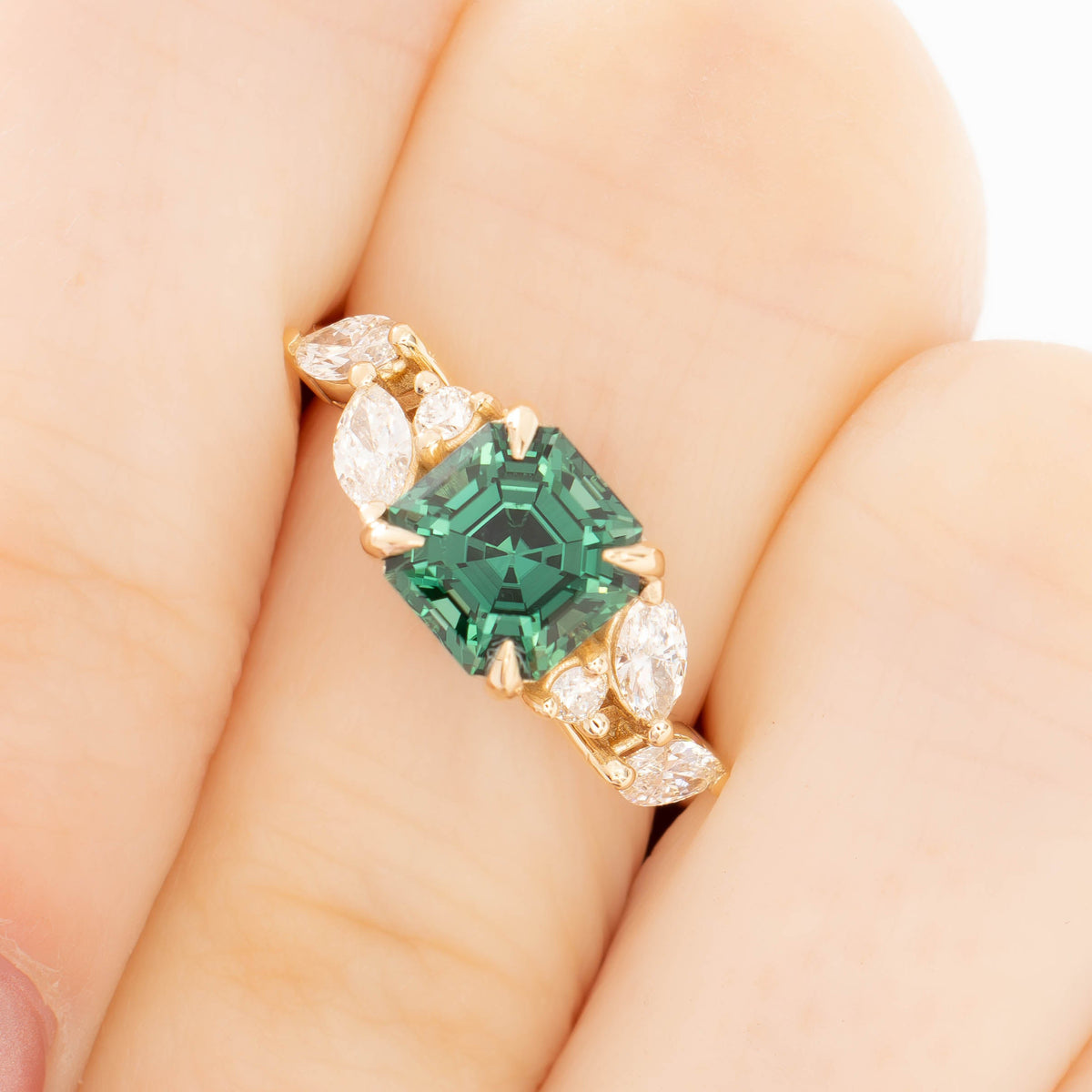 paola accented ring in yellow gold with asscher cut green lab sapphire