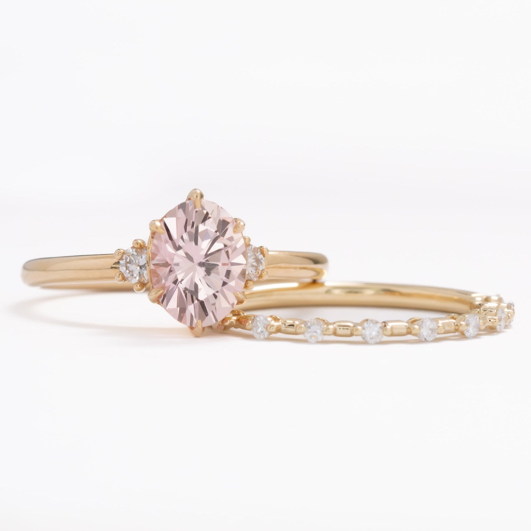 peach lab sapphire oval three stone engagement ring