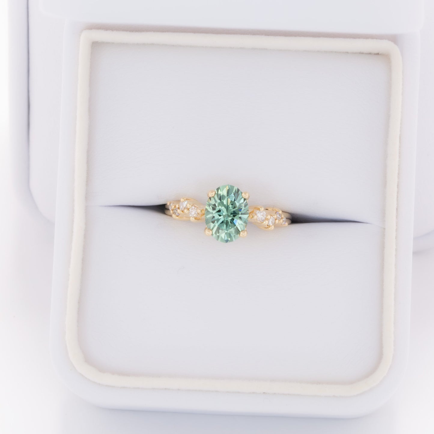penelope engagement ring in yellow gold with oval green lab sapphire