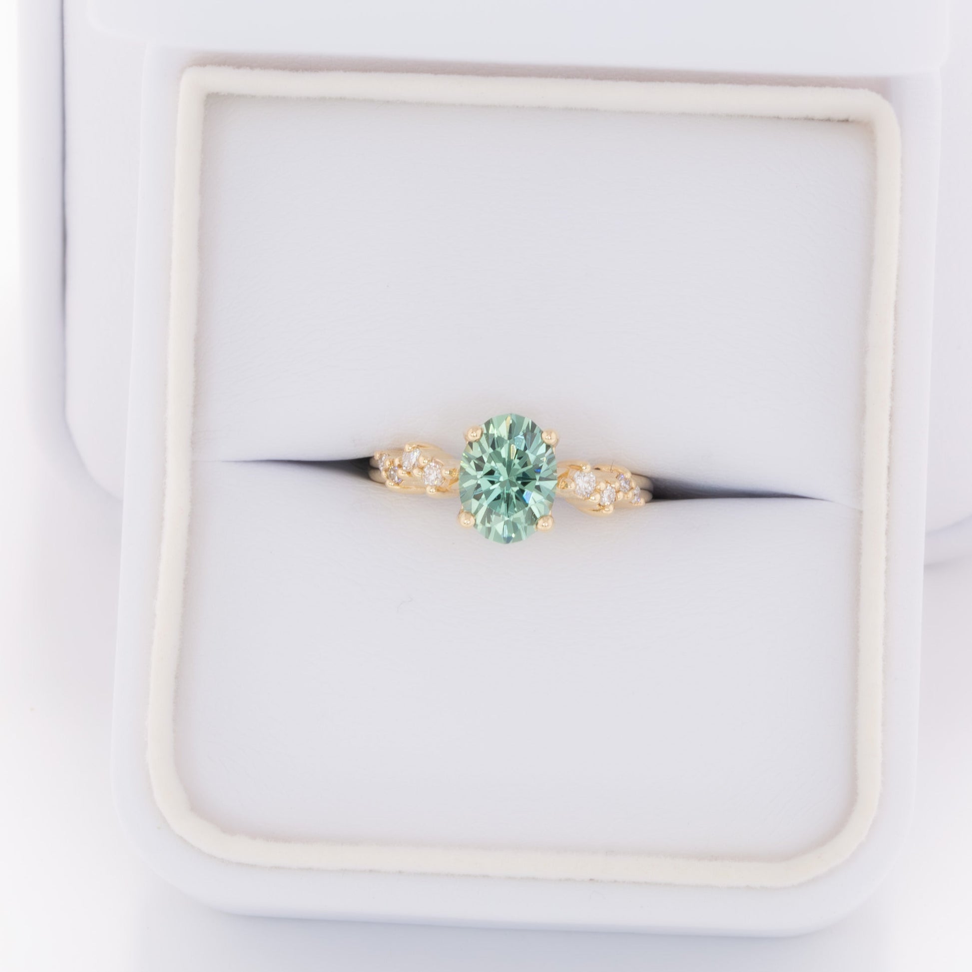 penelope engagement ring in yellow gold with oval green lab sapphire
