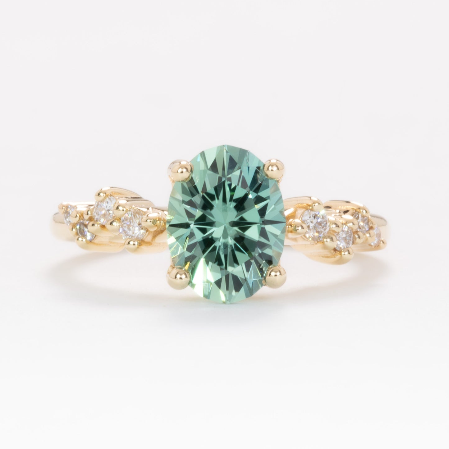 penelope engagement ring in yellow gold with oval green lab sapphire
