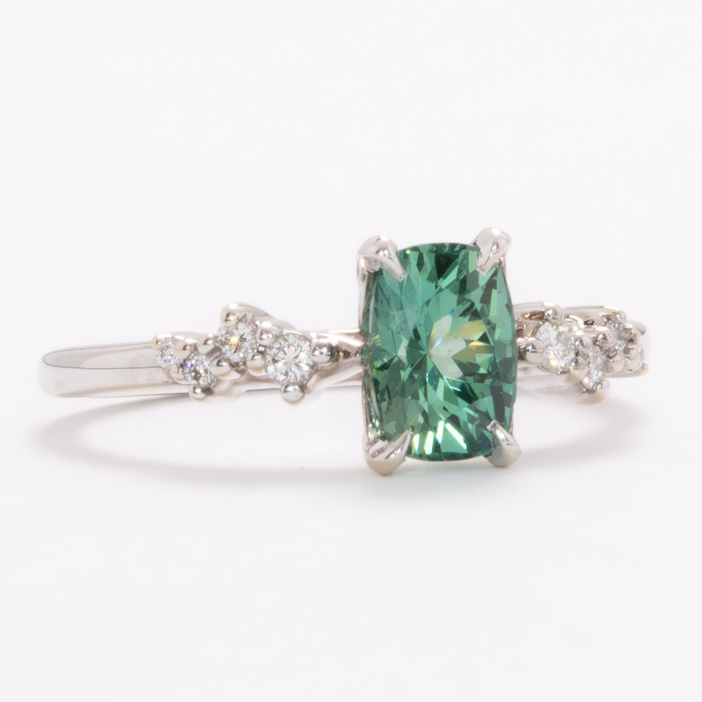 penelope wedding set with elongated cushion green lab sapphire