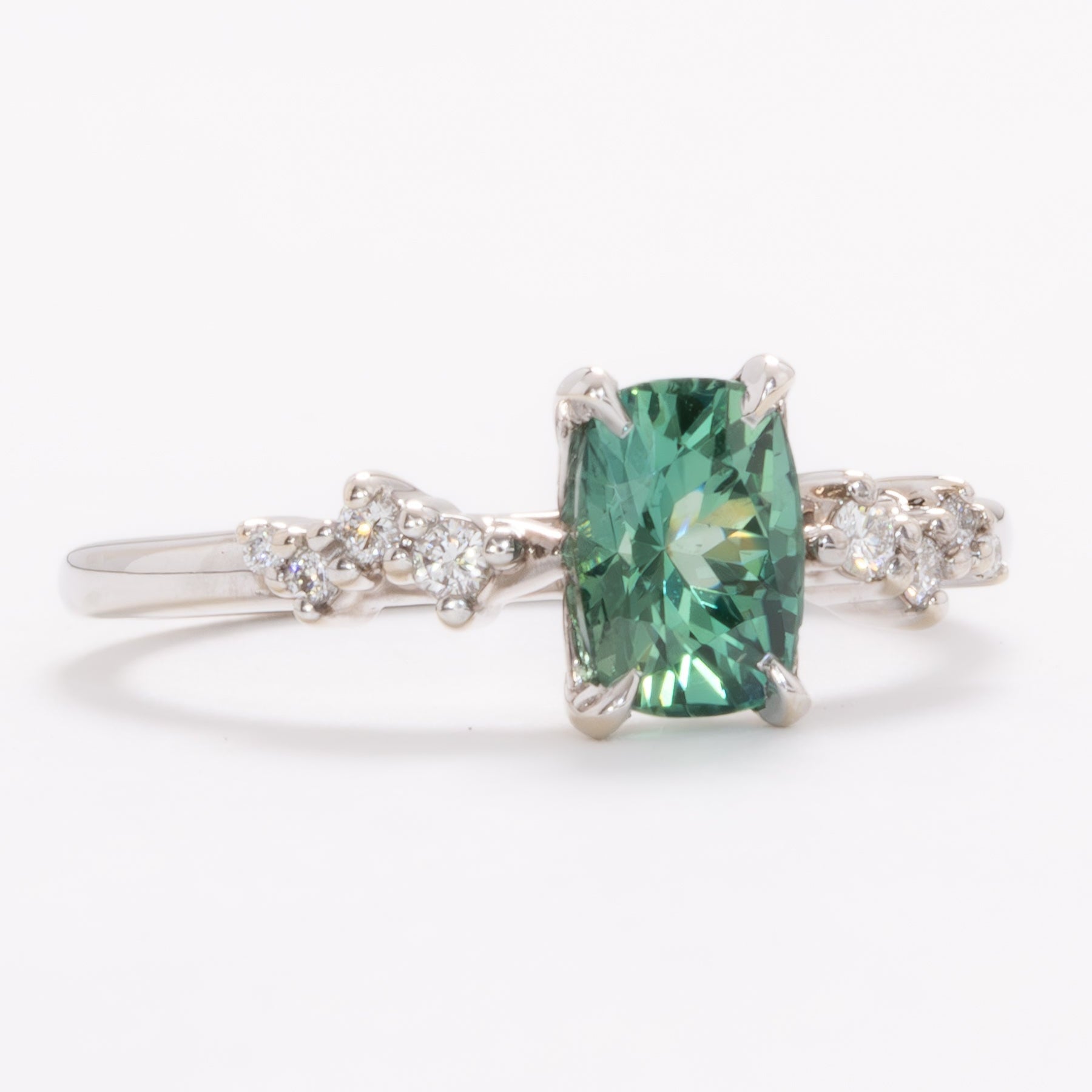 penelope wedding set with elongated cushion green lab sapphire