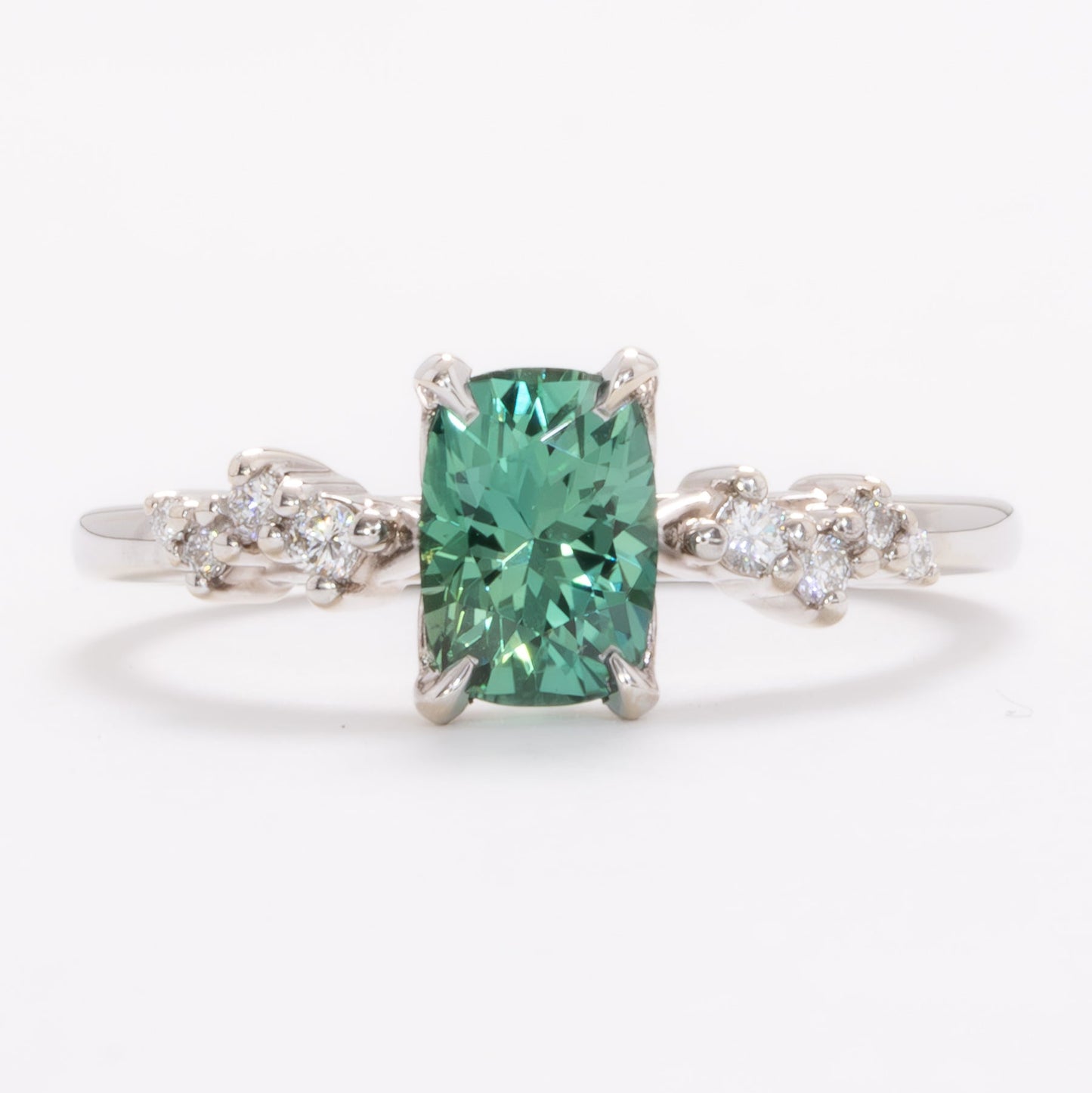 penelope wedding set with elongated cushion green lab sapphire