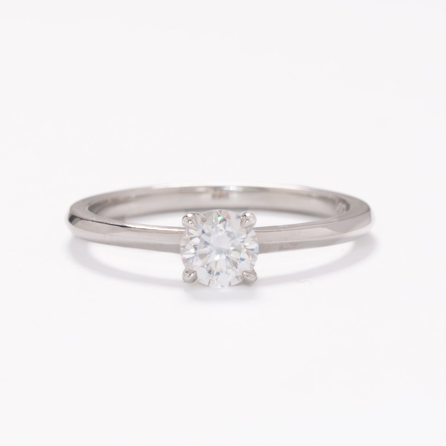 petite solitaire with round white moissanite