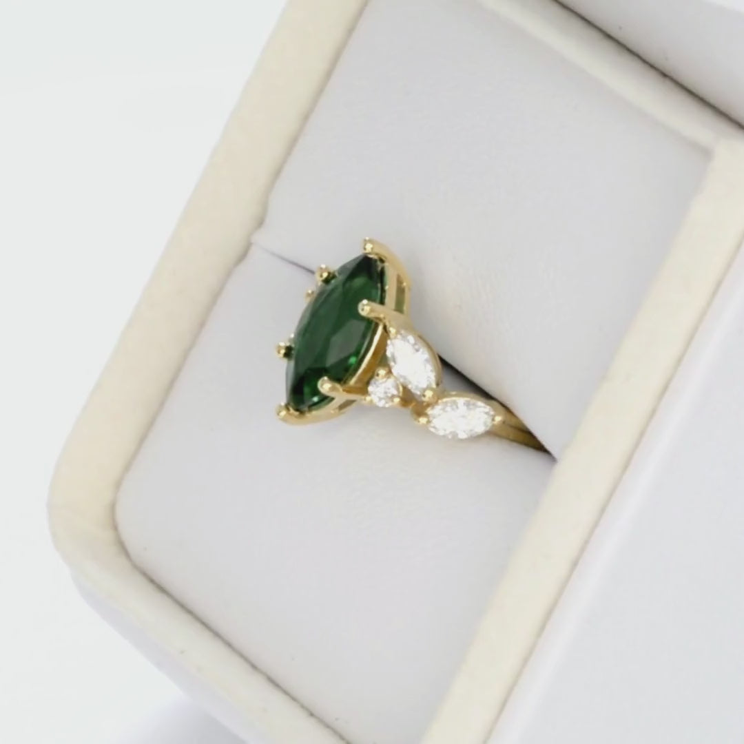 paola accented engagement ring with marquise lab emerald