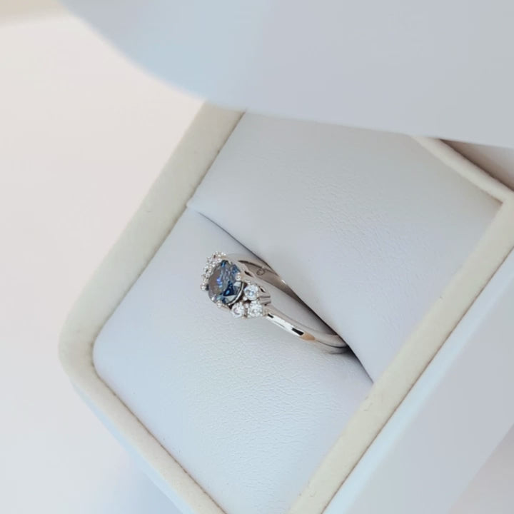 esilda ring with round blue moissanite