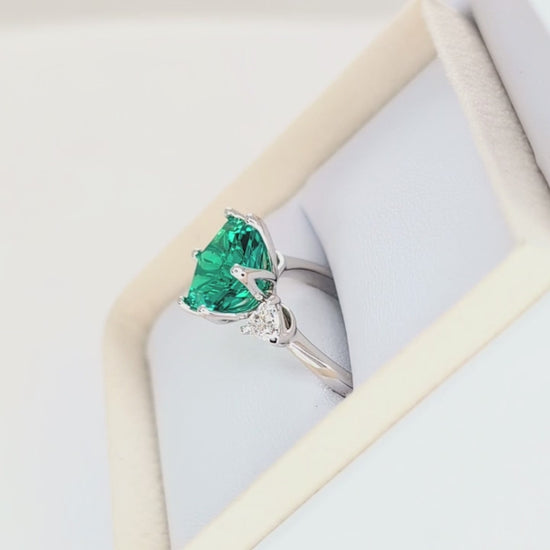 fiona three stone ring with hex cut lab emerald
