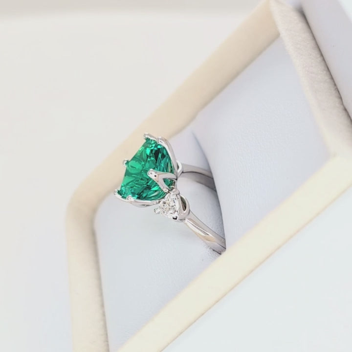 fiona three stone ring with hex cut lab emerald