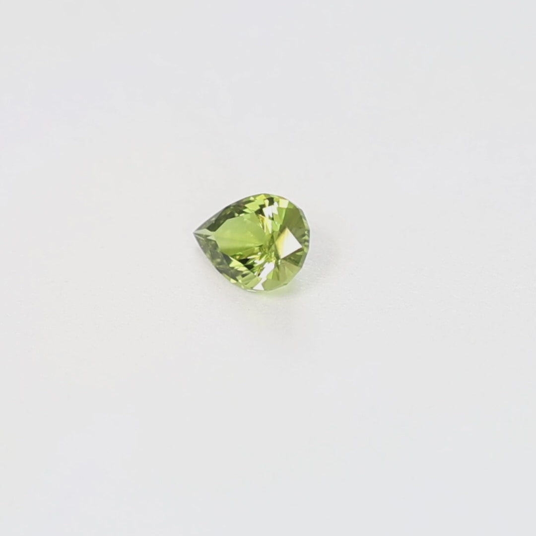 AU0138 0.62ct green-yellow eden pear australian sapphire