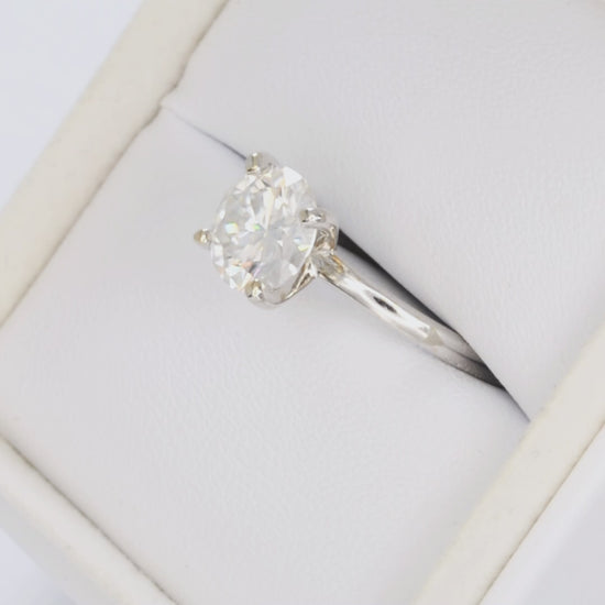 evie solitaire ring in white gold with round moissanite