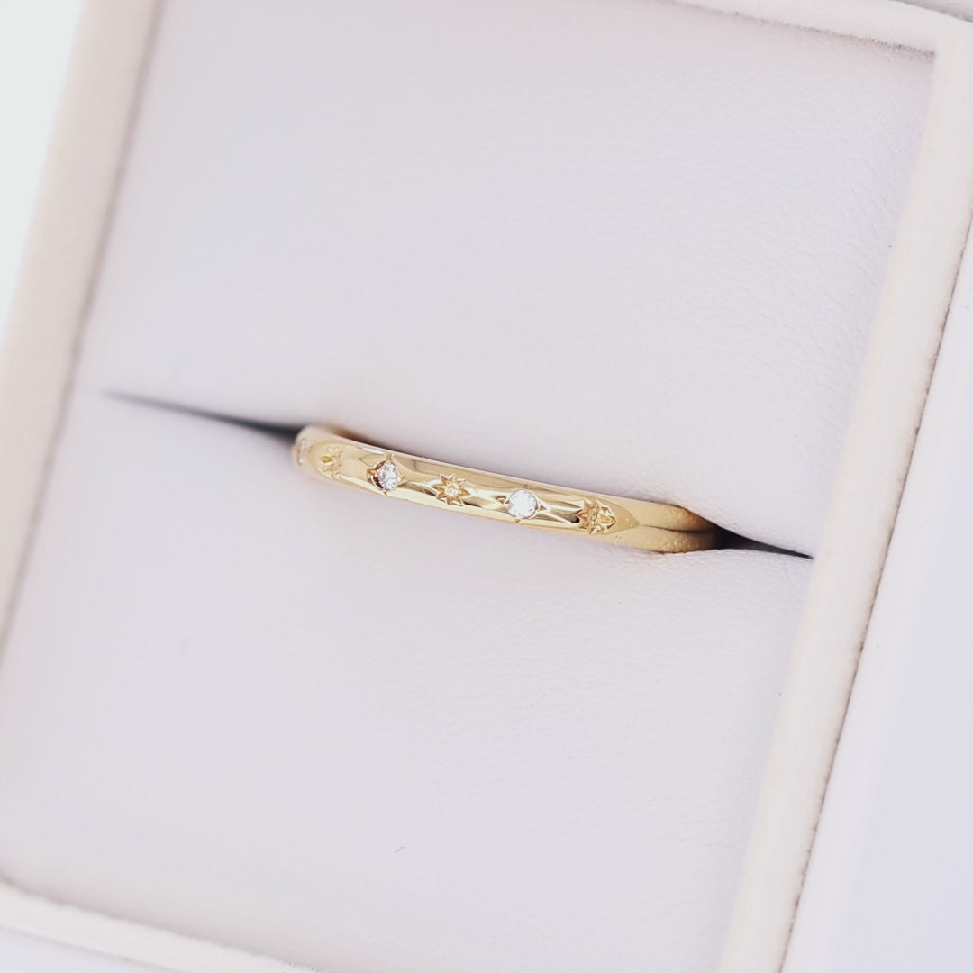 estel band in yellow gold with stars and lab diamond accents