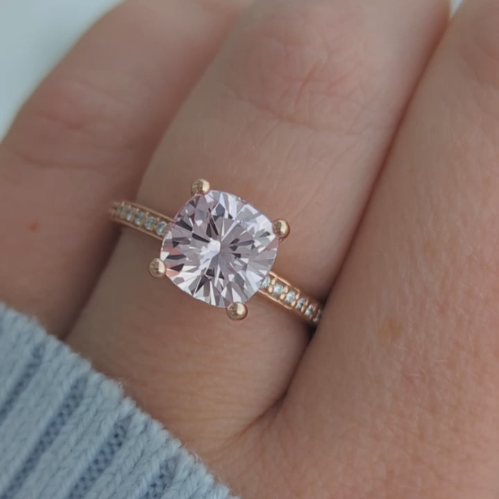 Kira hidden halo engagement ring with peach lab sapphire cushion