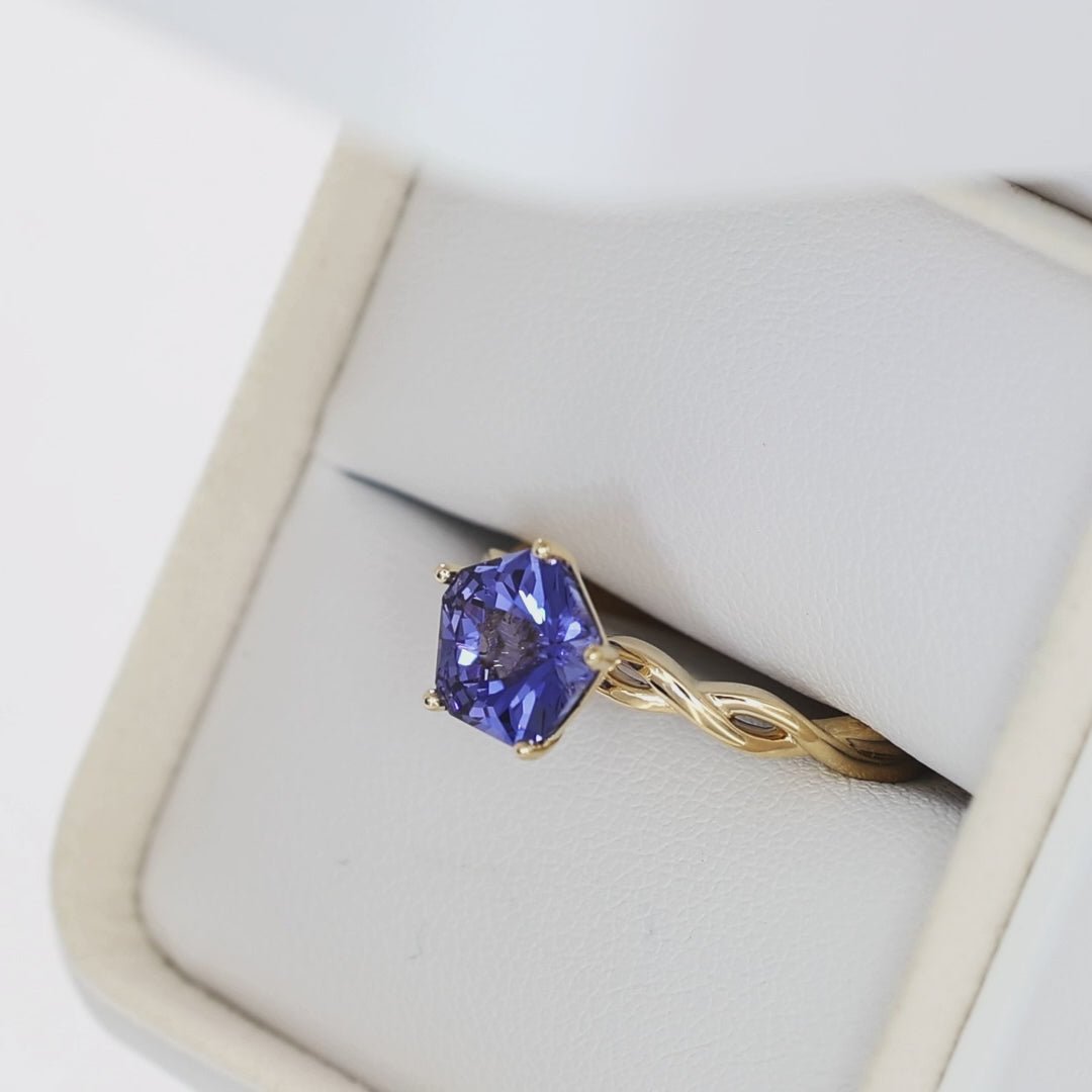 cressida solitaire ring with twisted band in yellow gold and hanami flower periwinkle blue lab sapphire