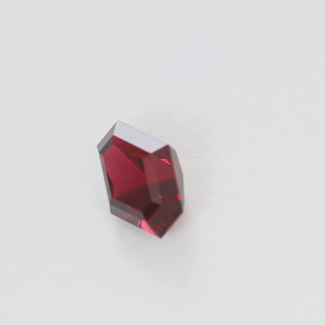 GR0107 3.15ct elongated hex cut red umba garnet