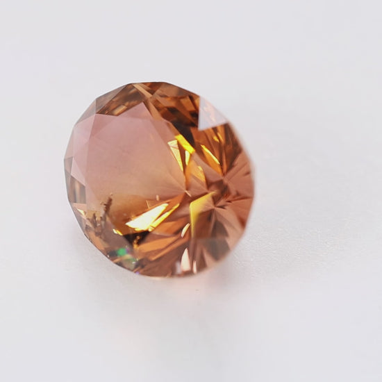 TL0109 13.91ct peach whiskey omni oval tourmaline