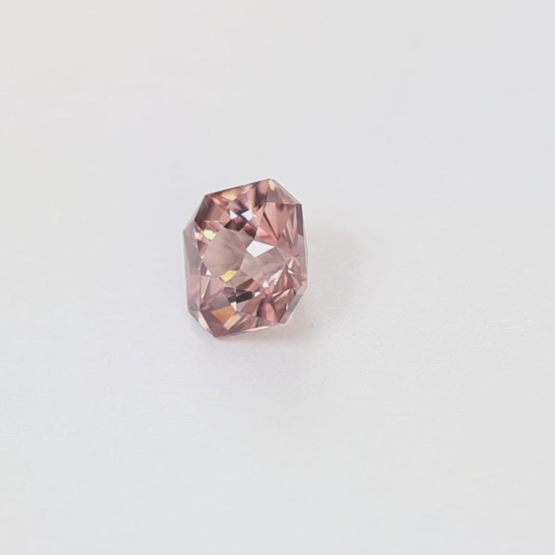 ZR0139 1.37ct void reaver asscher peach zircon
