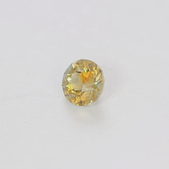 MS0136 1.50ct orange stormlight round montana sapphire