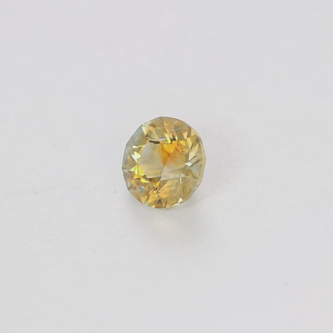 MS0136 1.50ct orange stormlight round montana sapphire