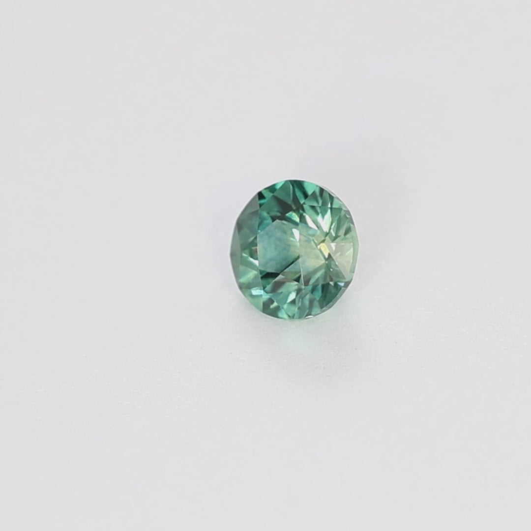 MS0210 1.25ct stormlight round blue-green montana sapphire