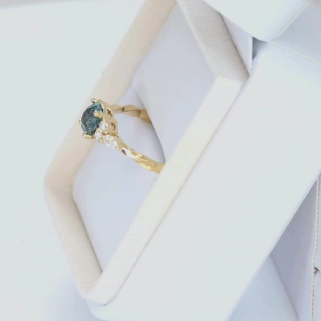 ardene ring in yellow gold with round montana sapphire