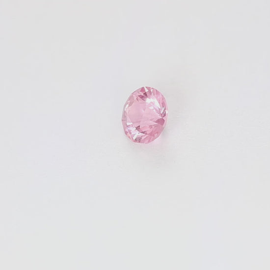 SP0100 0.57ct stormlight round pink spinel