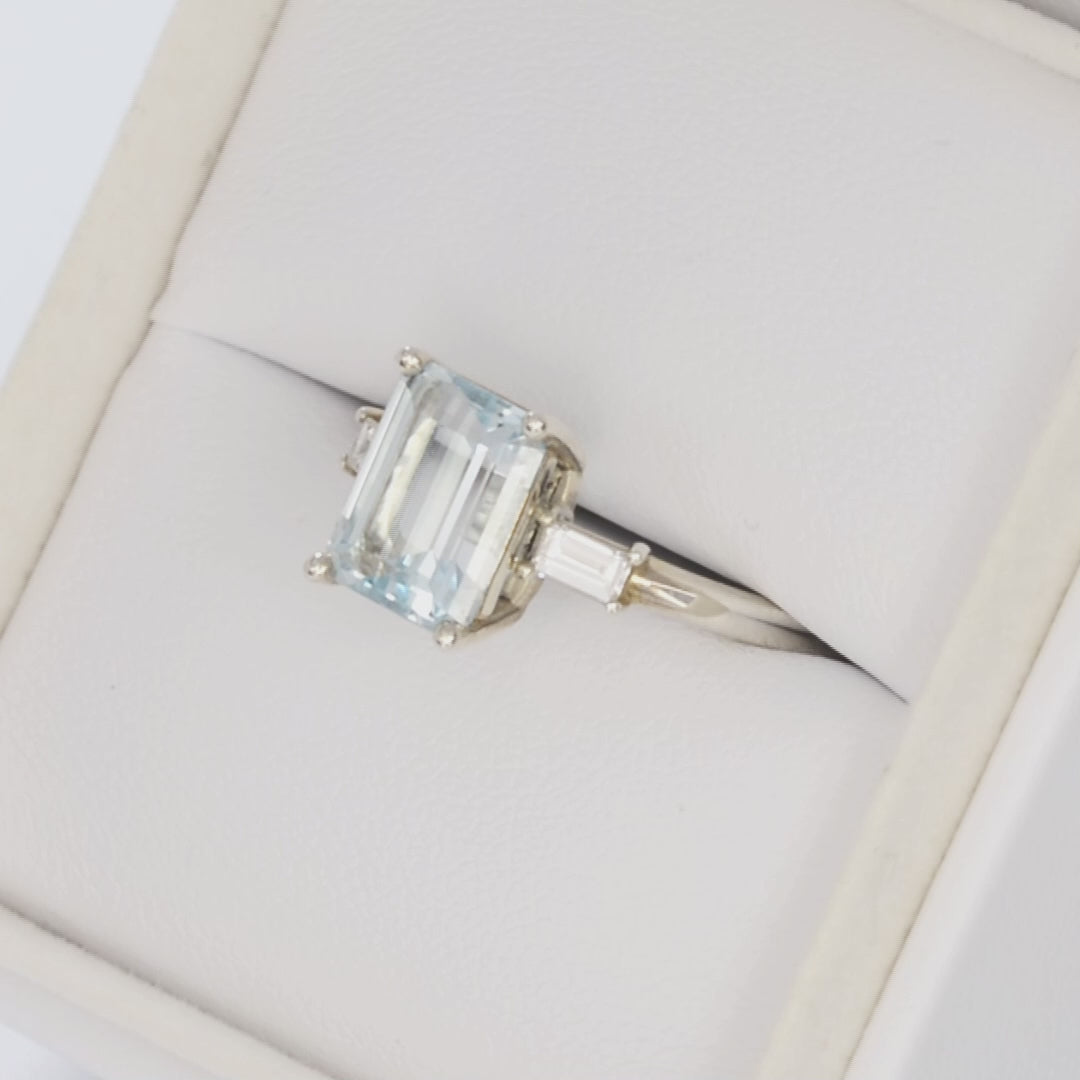 annie three stone ring with blue lab sapphire step cut in silver