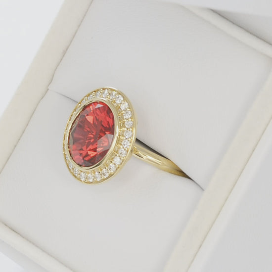 eleanor art deco halo ring in yellow gold with oval lab ruby