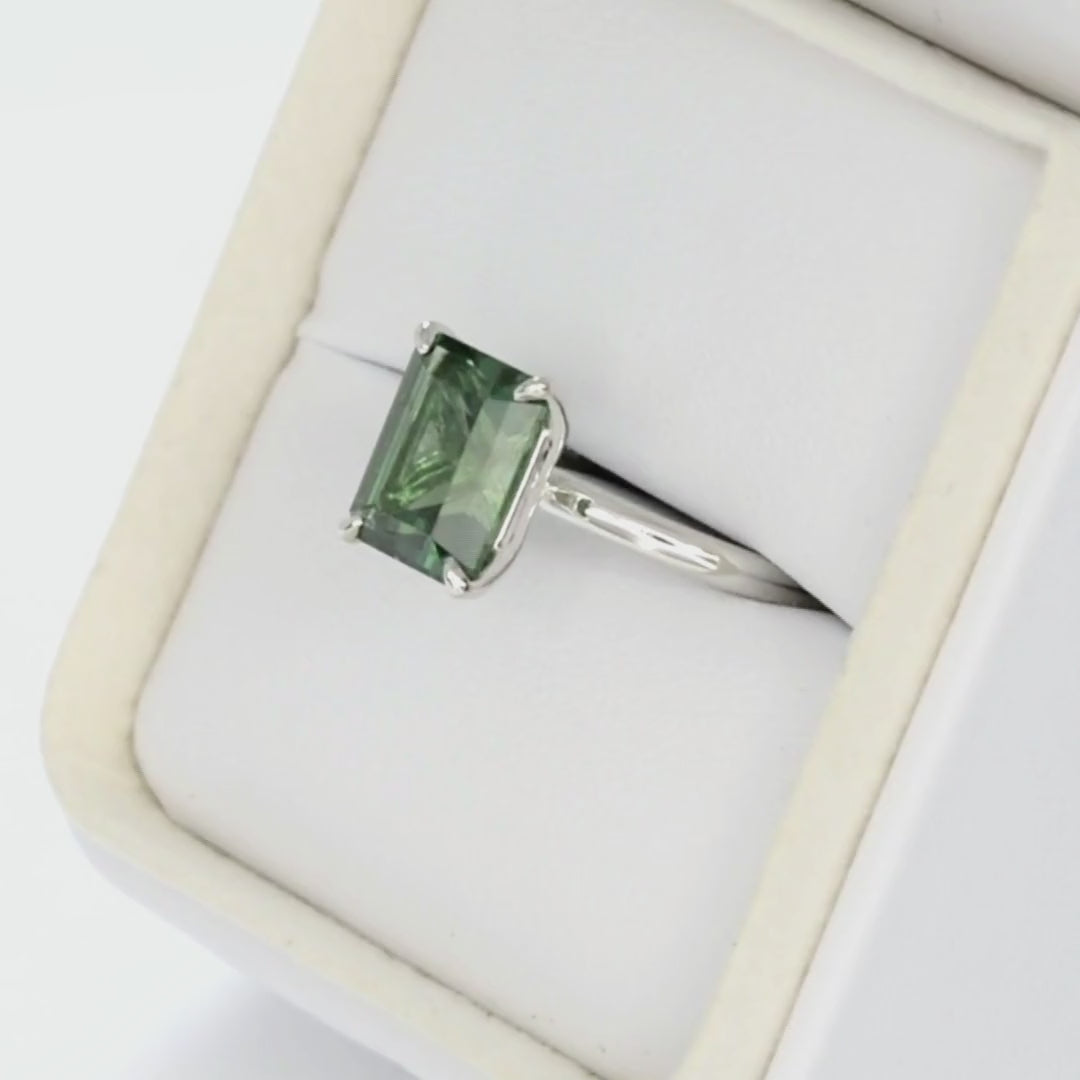 charmaine solitaire ring in white gold with green lab sapphire step cut