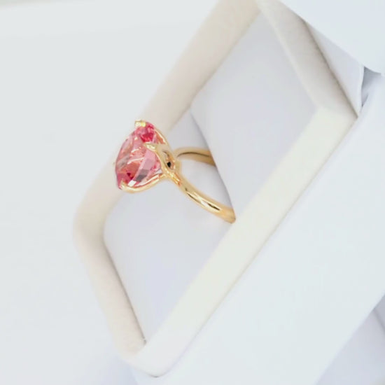 molly petal basket solitaire ring in yellow gold with oval pink lab sapphire