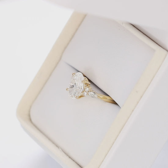 modified natalia ring in yellow gold with lab diamond oval