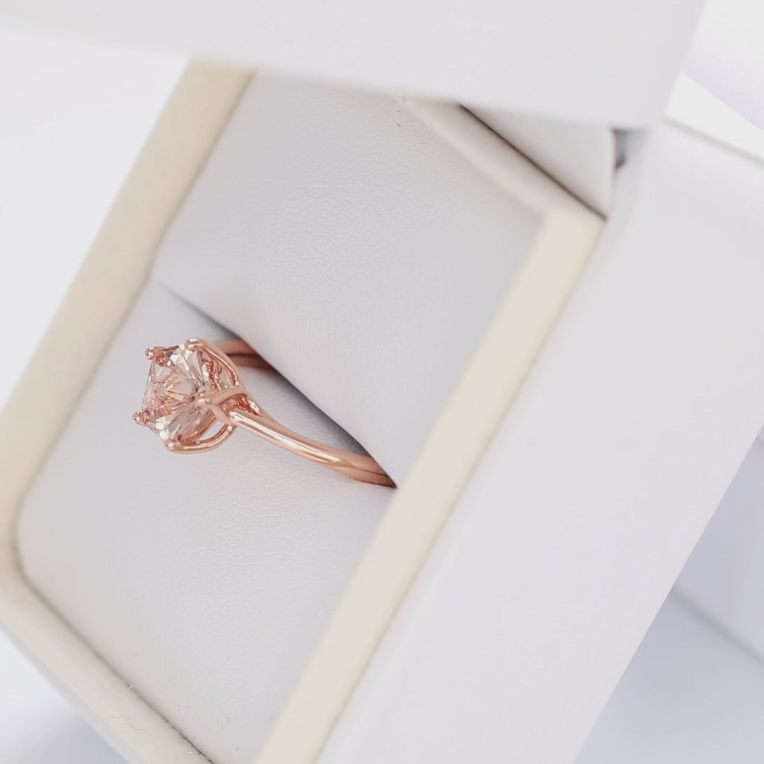 misha solitaire in rose gold with petal basket and pink lab sapphire flower